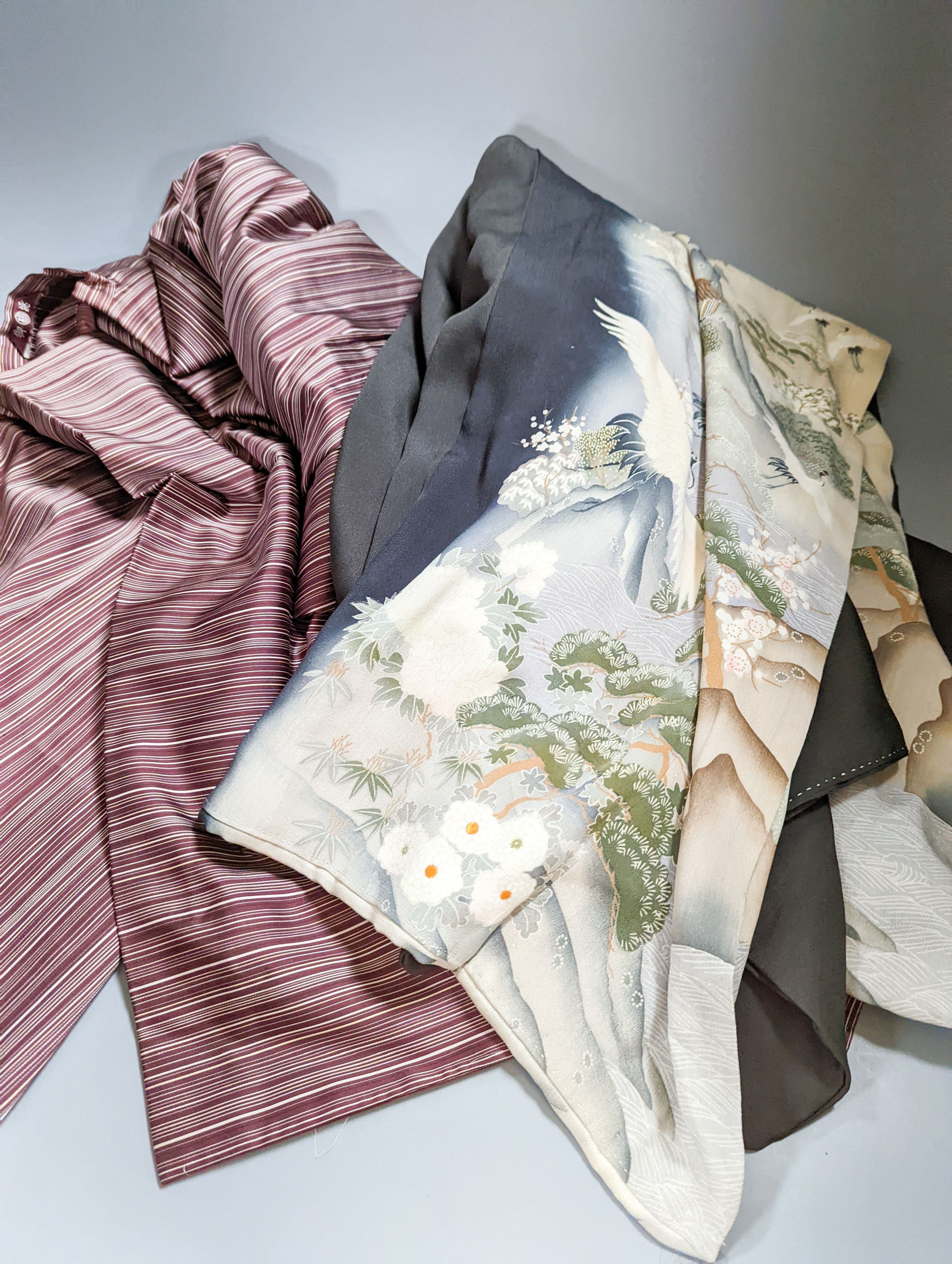 A reversible crepe de chine kimono, a cream printed kimono, a black kimono and a maroon stripe kimono (4)